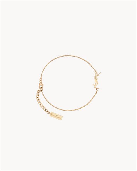 ysl opyum charm bracelet